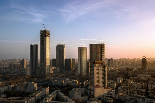 Stunning skyline featuring highrise buildings under a captivating sunset sky.